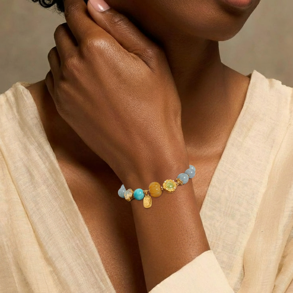 Kalyana Aura Pumpkin Bead Four-Leaf Clover Crystal Bracelet