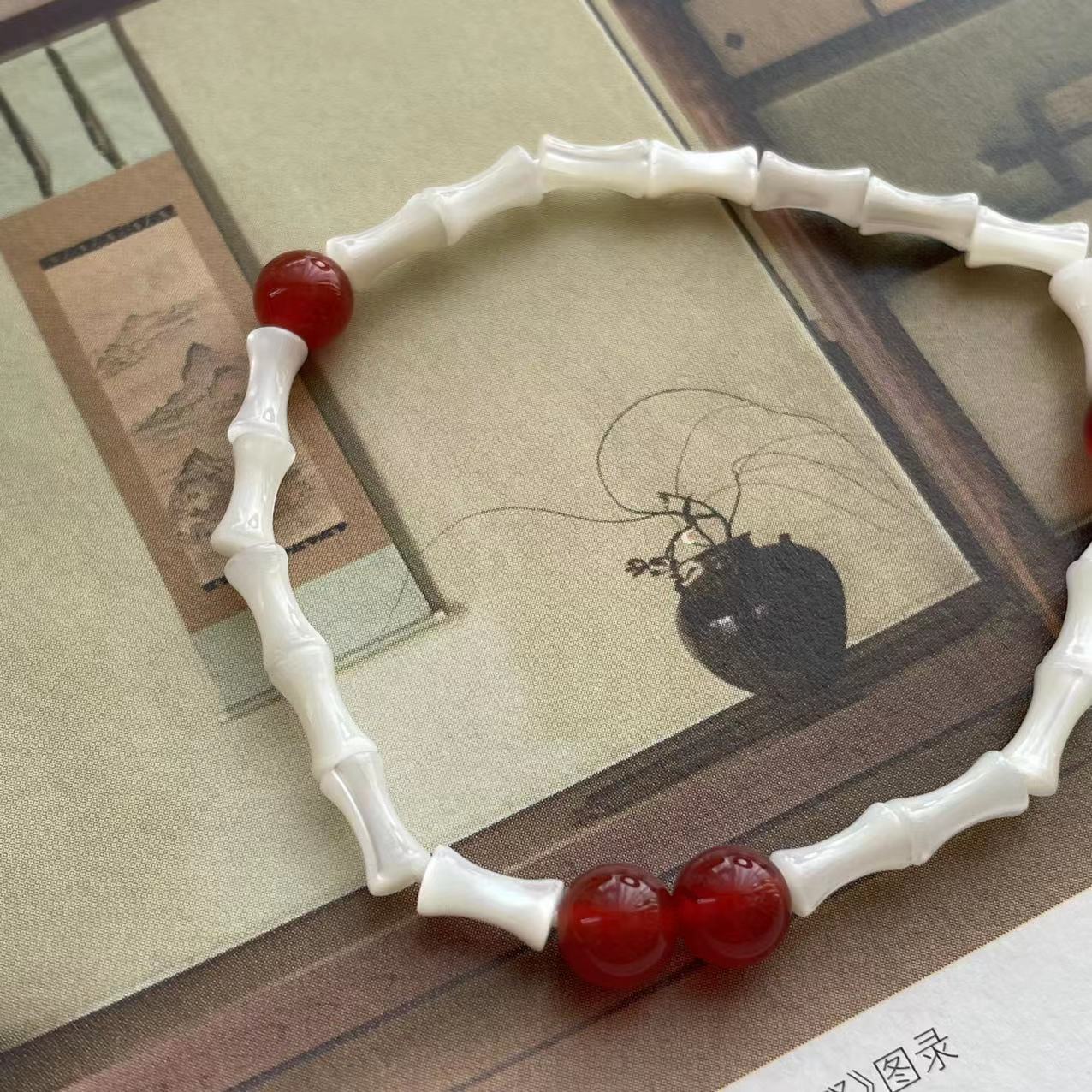 Kalyana Aura Natural Red Agate Bamboo-Shaped Shell Bracelet