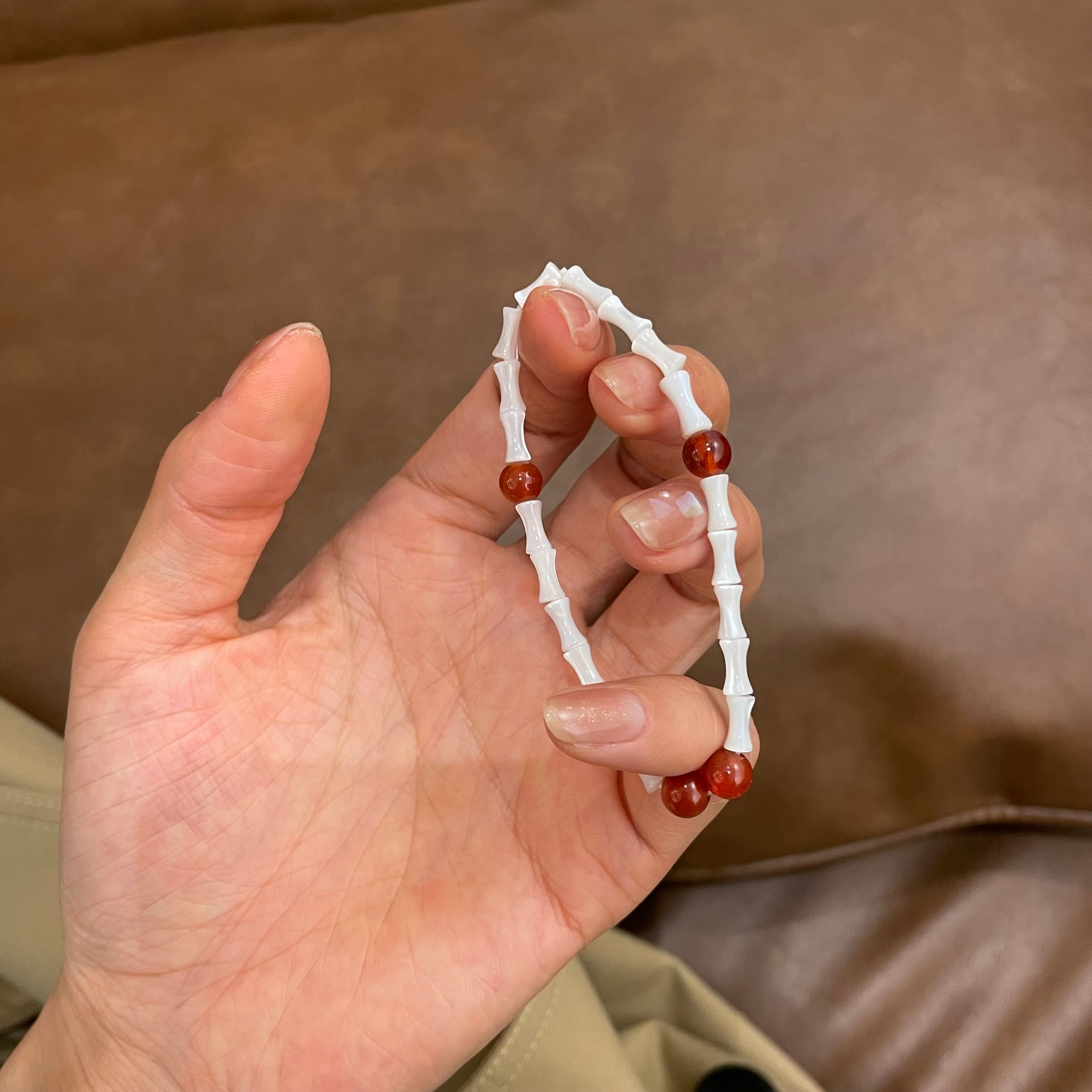 Kalyana Aura Natural Red Agate Bamboo-Shaped Shell Bracelet