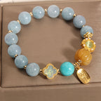 Kalyana Aura Pumpkin Bead Four-Leaf Clover Crystal Bracelet