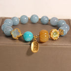 Kalyana Aura Pumpkin Bead Four-Leaf Clover Crystal Bracelet