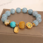 Kalyana Aura Pumpkin Bead Four-Leaf Clover Crystal Bracelet