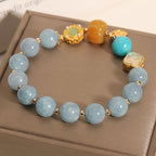 Kalyana Aura Pumpkin Bead Four-Leaf Clover Crystal Bracelet